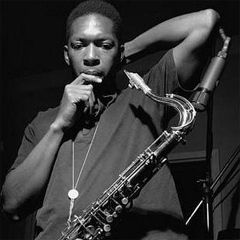 Caption: Composer, sax titan, and jazz icon John Coltrane.