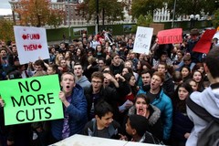 Caption: Students walk out of Garfield High School to protest education cuts , Credit: From the Seattle Times