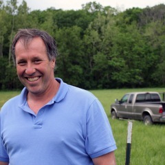 Caption: hris Boeckmann grows turkeys for Cargill on his Loose Creek, Mo., farm. But he also raises grass-fed all-natural beef for his private label. , Credit: Peggy Lowe/Harvest Public Media