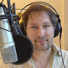 Caption: ElJay A. on microphone , Credit: ElJay A. on microphone