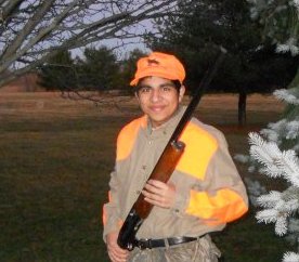 Caption: Dillon Paul with Smith & Wesson semi-automatic shotgun, Credit: submitted photo