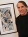 Caption: Kurt Seaburg with a his father's Sami art.