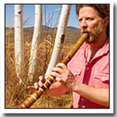 Caption: Phil Nyokai James playing the shakuhachi