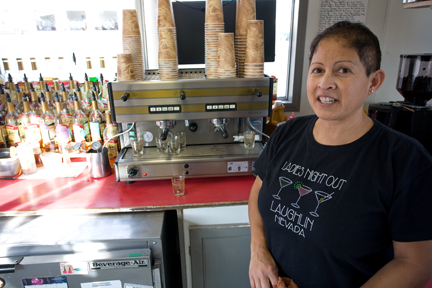 Caption: Gloria Sauceda and her husband Armando own Gloria's Espresso in Madras. They have noticed a drop in income as the economy has slowed down.