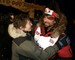 Caption: Lance Mackey is greeted by his mother, Kathie Smith, at the finish line of the Iditarod Trail Sled Dog Race in Nome, Alaska, early Wednesday, March 12, 2008., Credit: Al Grillo (AP)