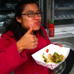 Caption: Reporter Ana Castillo eating a Kogi taco, Credit: Miguel Macias