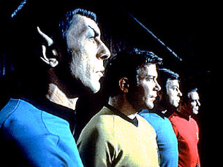 Caption: Spock, Kirk, McCoy, Scotty, Credit: www.startrek.com