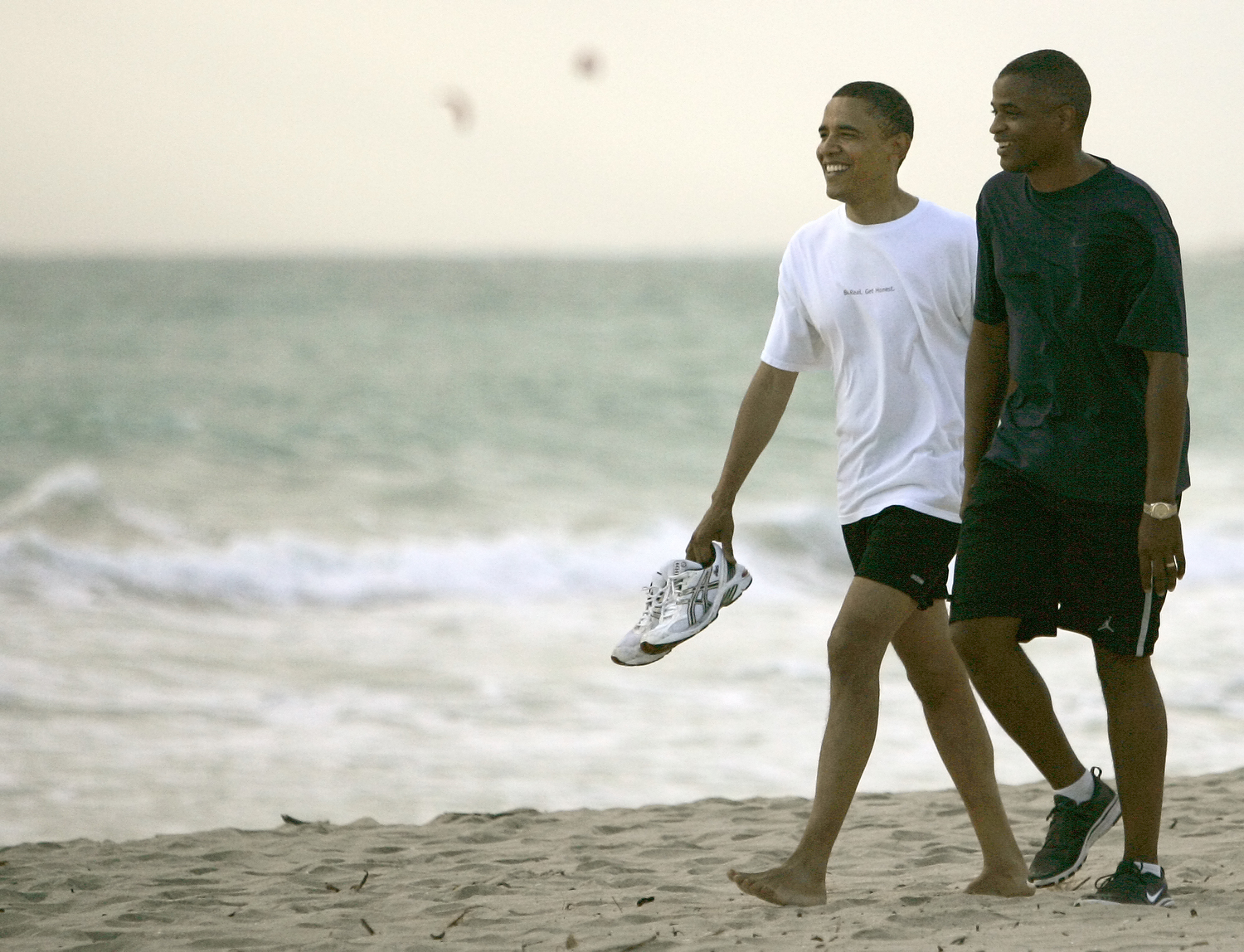 Caption: Barack Obama on Kailua Beach, Credit: Mike Burley | The Honolulu Star-Bulletin  August 2008
