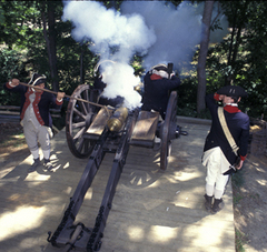 Caption: Cannon firing at encampment, Credit: Jamestown Yorktown Foundation