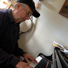 Caption: Teddy Charles composing a new piece, Credit: Charles Lane