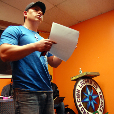Caption: Josello Lucero speaking on behalf of his murded broter, Credit: Charles Lane