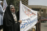 Caption: A demonstration for women's rights in Baghdad., Credit: AP Images