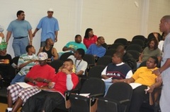 Caption: Members of the OK at a Saturday meeting