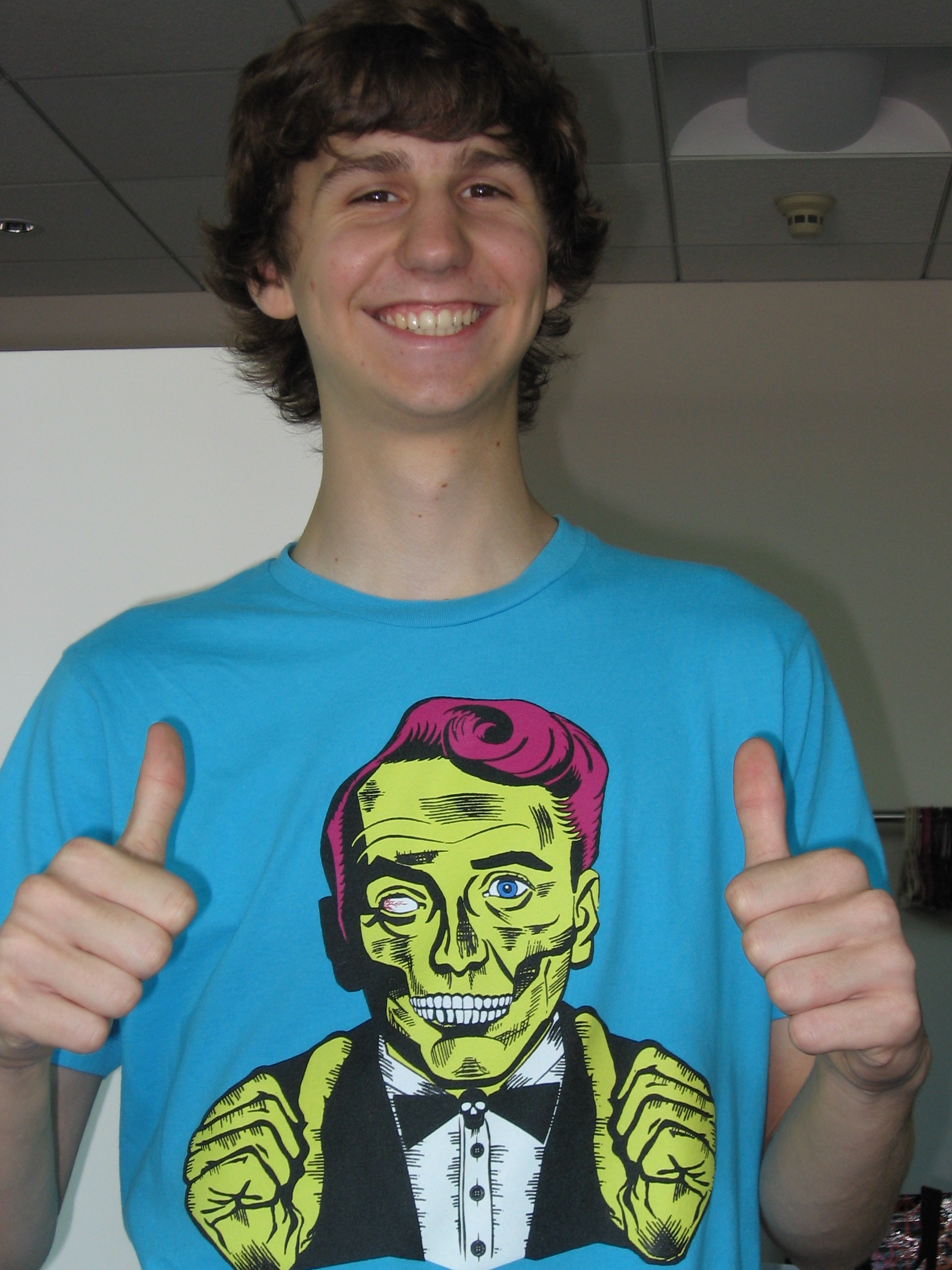 Caption: Co-host Artur Sapek shows off his wicked t-shirt. Nothing embarrassing about a zombie thumbs up..., Credit: Nathan Friend