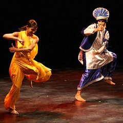 Caption: Host Raakhi Sinha in Bhangra dancing action.