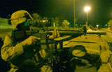 Caption: A US soldier on patrol in Tikrit, Iraq., Credit: The Associated Press
