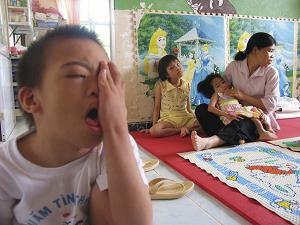 Caption: A Vietnamese boy exposed to Agent Orange., Credit: Kirk Torregrossa