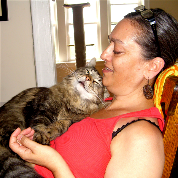 Caption: Carole and her cat Romeo., Credit: WBEZ/Adriene Hill