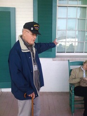 Caption: A tour guide at Carnton Plantation explains the home's role in the Civil War Battle of Franklin, Credit: Blake Farmer