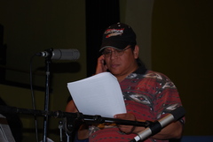Caption: Cochise Anderson at the Mic During A Skit in "Dress" Rehearsal, Credit: John Gregg, Sr.