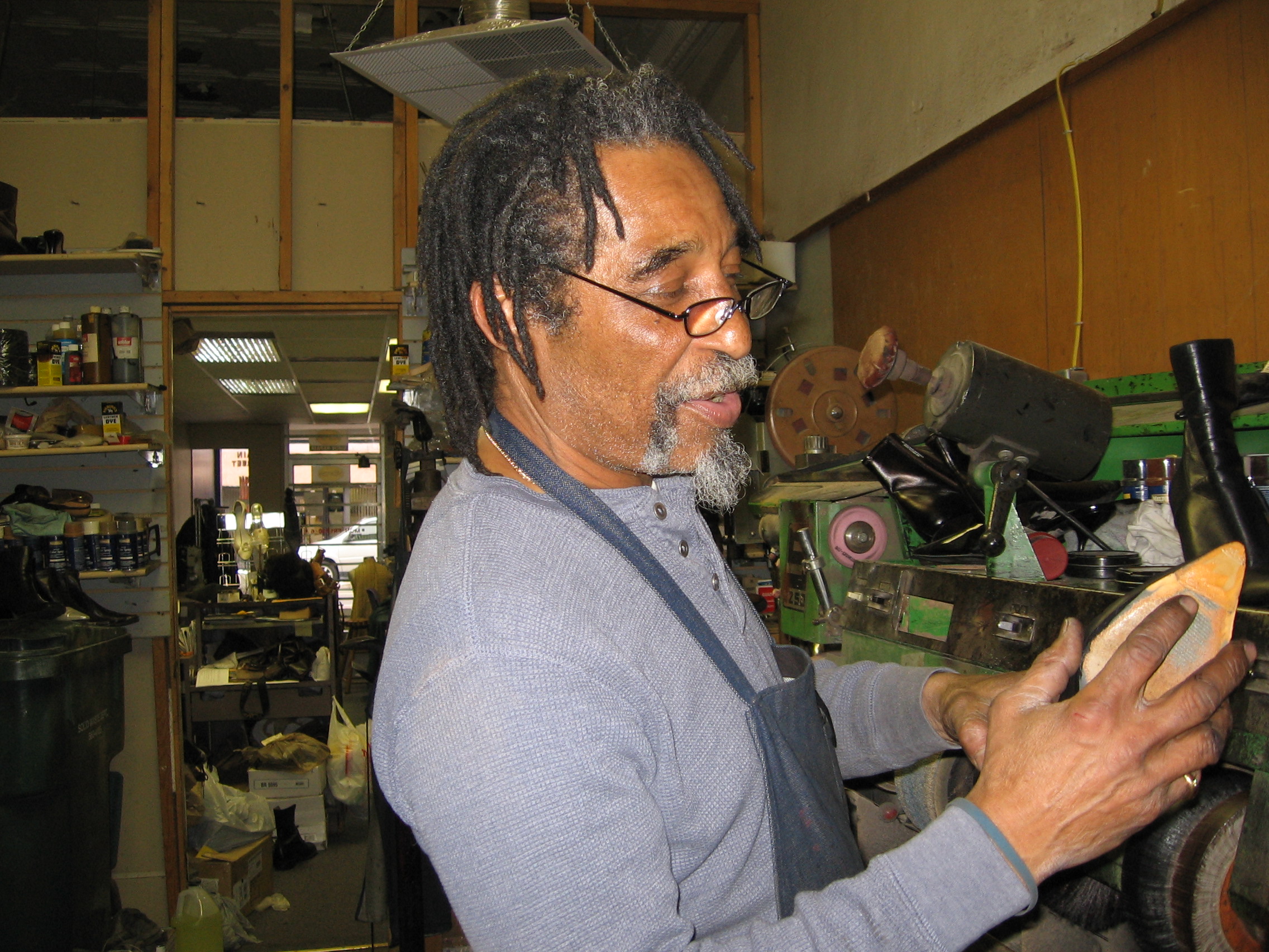 Caption: Gayford Caston, Shoe Repairman, Credit: Jill Strauss