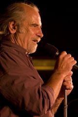 Caption: Andy Christie live at The Moth
