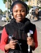 Caption: Lindy Hlobo ready to do some interviews near Cape Town's Greenpoint Stadium, Credit: Photo by Kate Streek