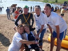 Caption: Athletes in Tandem matches athletes like Dennis Vanderheiden with disabled kids like Zach Scott to complete running and triathlon races.