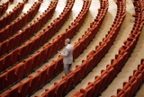 Caption: A new member of the Iraqi Parliament in Baghdad on June 14th, 2010., Credit: Photo courtesy of AP.