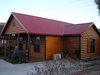 Log_cabin_with_new_metal_roof_fs
