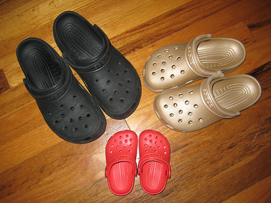 Black-gold-and-red-crocs