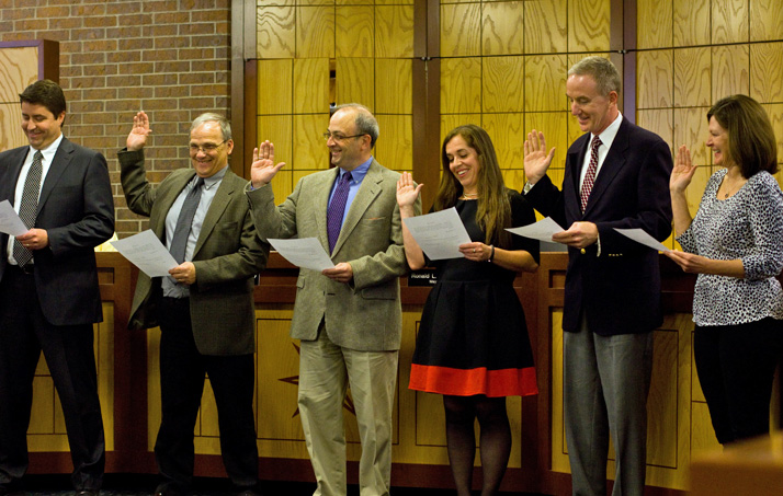 Prairie Village City Councilors (from left) Eric Mikkelson, Steve Noll, Terrence Gallagher, Jori Nelson, Dan Runion and Laura Wassmer were sworn-in at the start of Monday's council meeting.