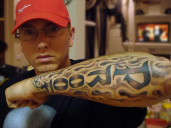 eminem tattoos 2010. eminem lyrics for beautiful.