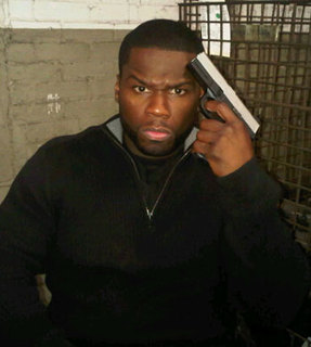 50cent-gun-12142010.jpg