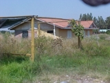 se vende parcela de 500 mts.2 con casa en "las praderas"