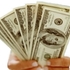 Dolares_20en_20mano_thumb