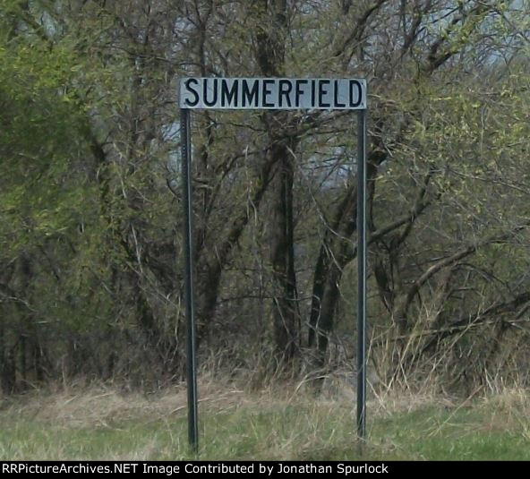 Location sign near old tracks