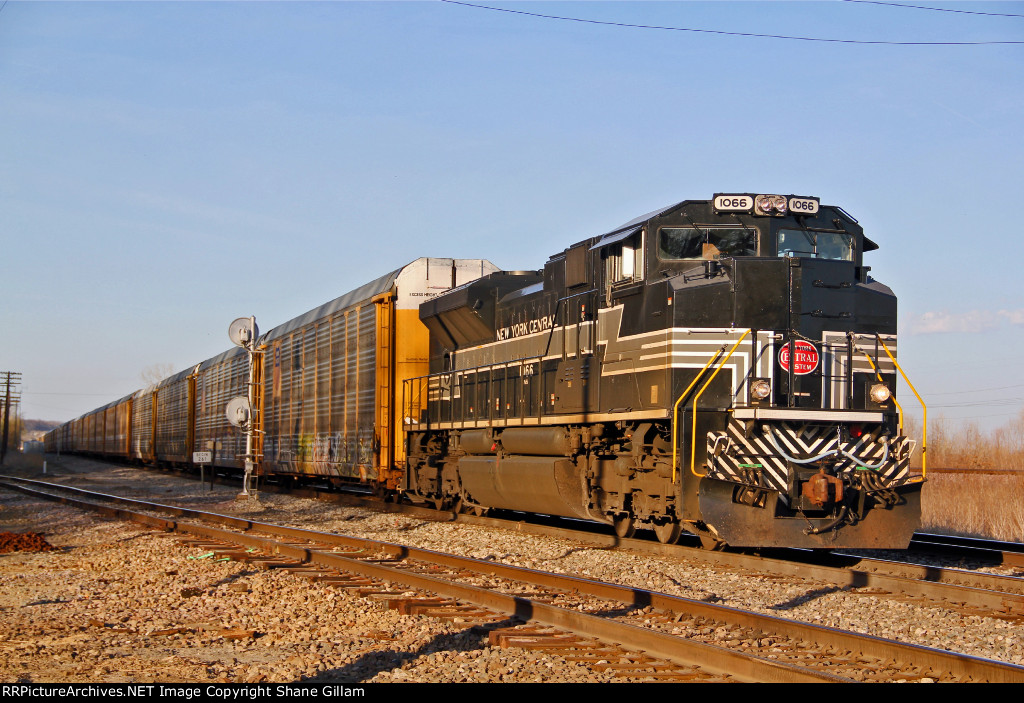 NS 1066 Leads NS 239 WB into the setting sun..