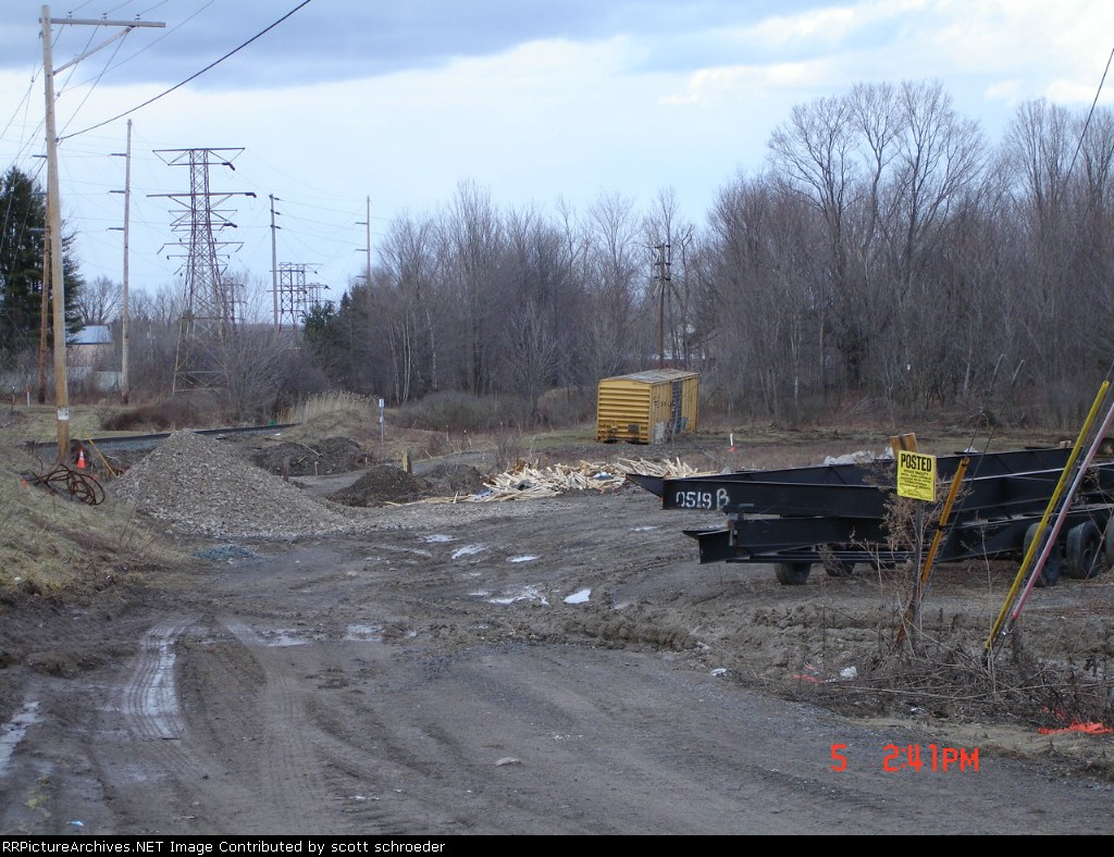Lone Railbox Boxcar w/no trucks along side the main looking NB