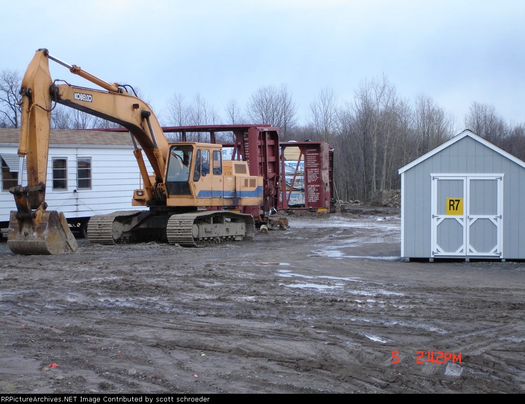 Centerbeam Flatcar's in a muddy field