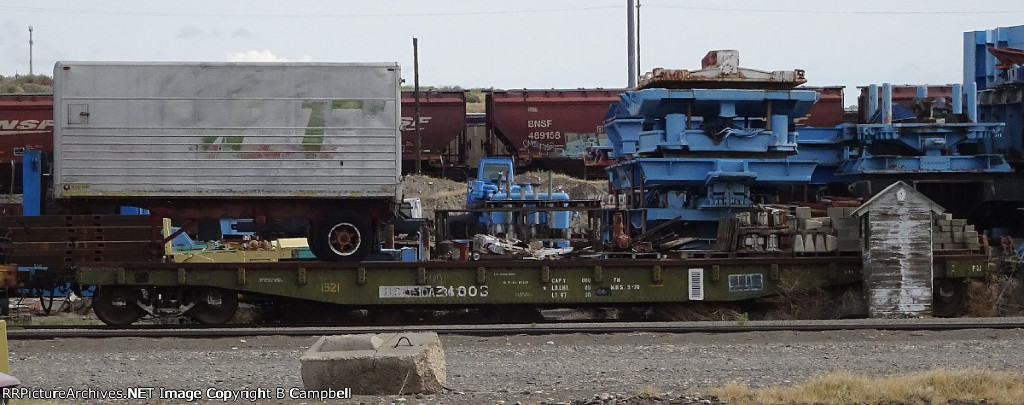 Unknown Flatcar Registry with BNSF 489158 in the background