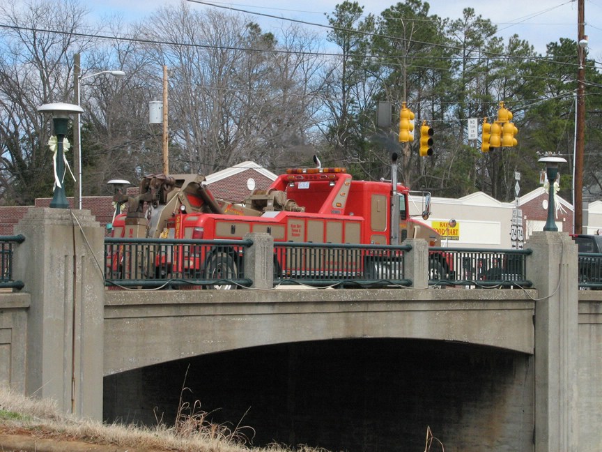 The wrecker for the big guys turns off US 74 business