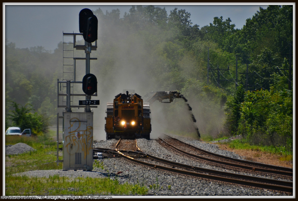 That's mostly dirt, the ballast goes back on the roadbed.