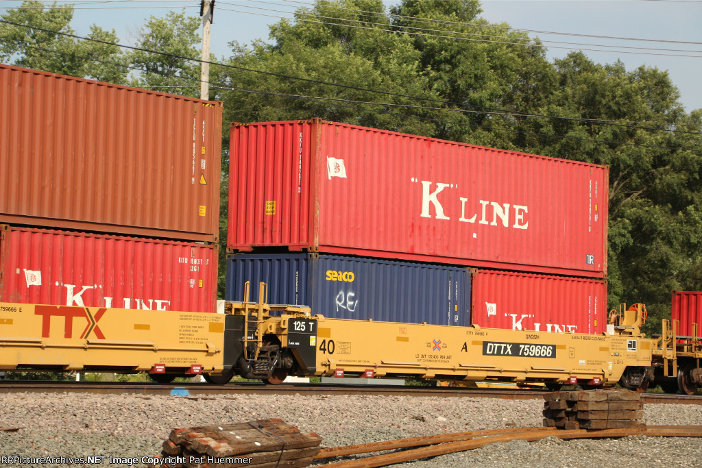 DTTX 759333 sports the "Next Load any Road" slogan, normally reserved for the box car fleet