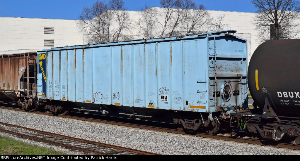 GACX 56787 11-1990 built 4895cf 2-gate airslide covered hopper in buffer car service on a NB empty ethanol train on CSX in Cartersville GA 2-27PM 01-28-2017