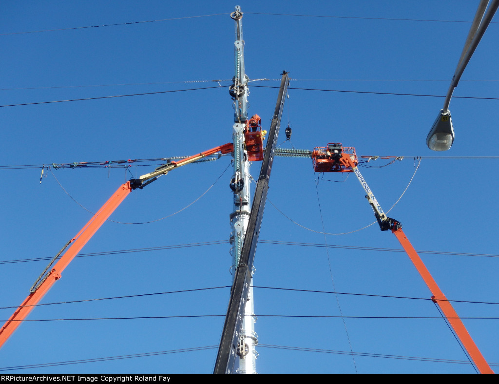 INSTALLING  THE INSULATERS