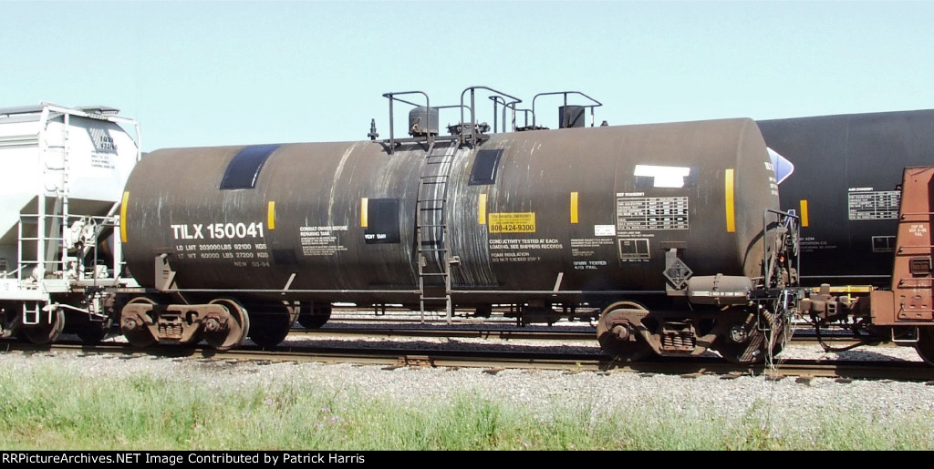 TILX 150041 heavily-patched tank car in CSX pocket yard in Valdosta GA ...