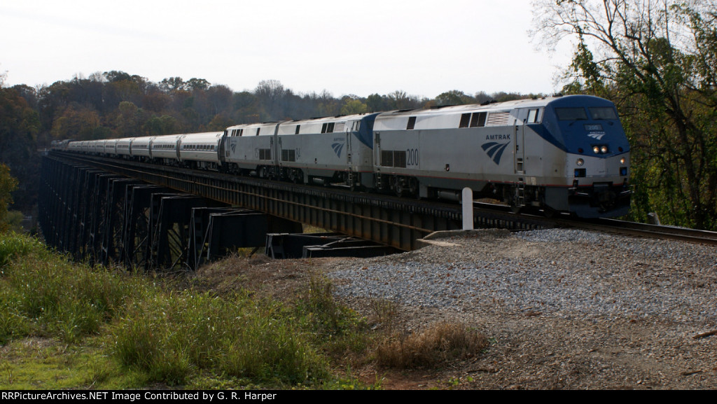 NS 010 with AMTK 200 leading crosses the James River.  Deadhead move to Washington following the weekend of excursion trips out of Spencer, NC.