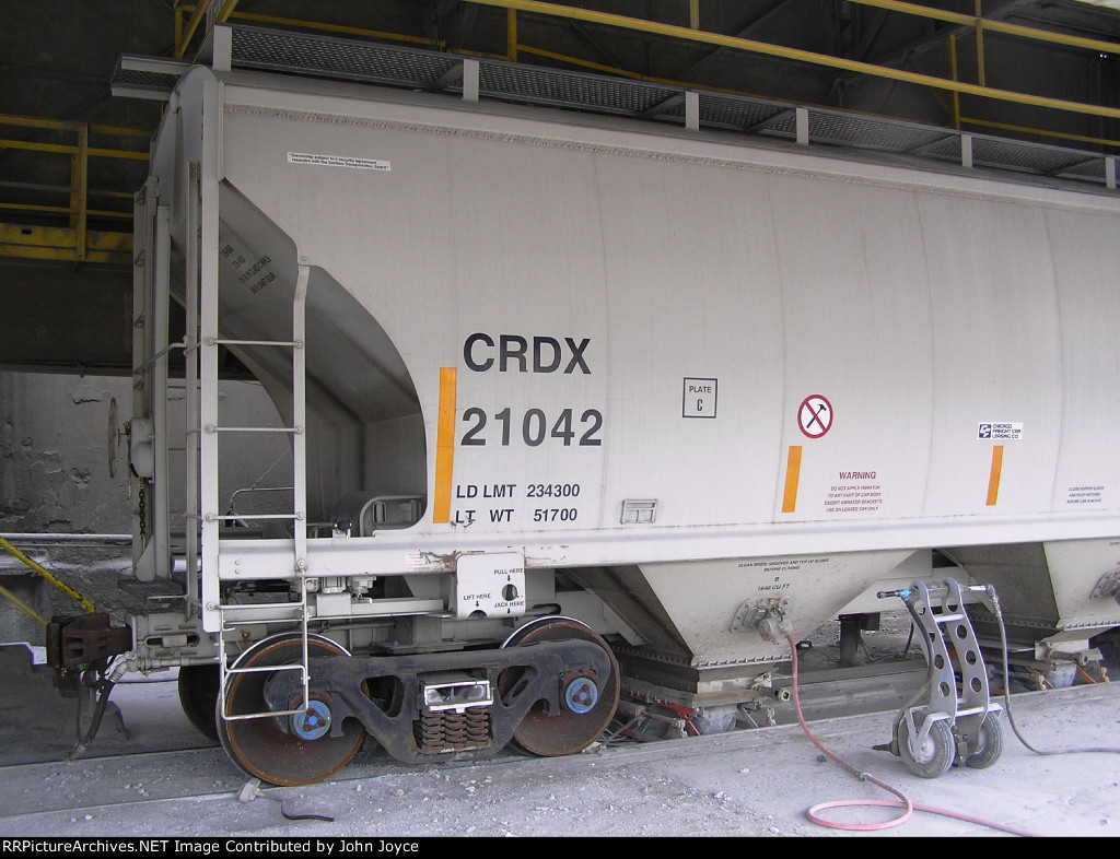 CRDX 21042 unloads portland cement.