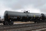 One of a long line of tank cars on the yard's north service track